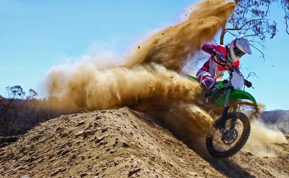 Nick Lean on the KX250F - berm exits stage left Nick Lean on the KX250F - berm exits stage left