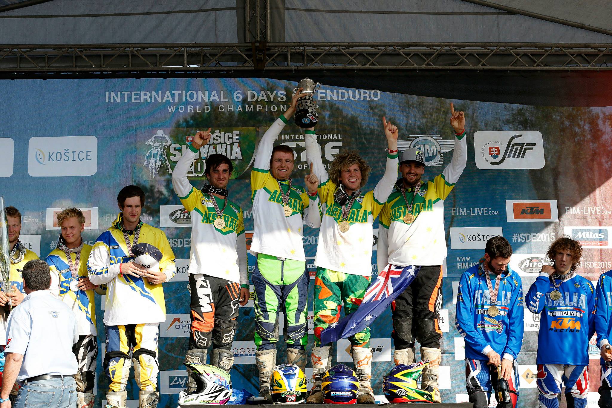 Aussie boys holding up the FIM Junior World Trophy