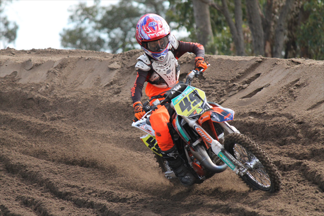 KTMs Jett Lawrence charged to a commanding qualifying race win today at Shrubland Park for the first official race day of the 2015 KTM AJMX. Image - Tenaya Smith - TS Photographics