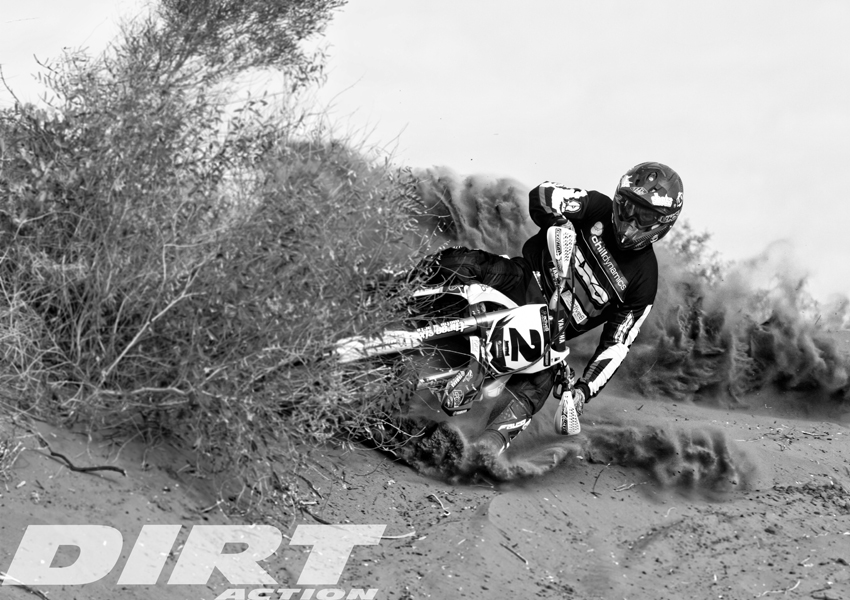 Jarrod Bewley blowing an Alice Springs sand hill apart on his 2012 Finke race bike