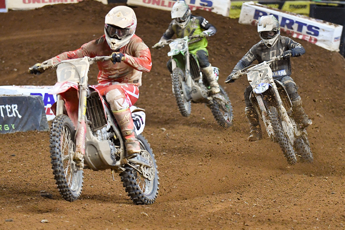 Vince Friese - Smartop Motorconcepts Honda Yoshimura, Chad Reed - Monster Energy Factory Yamaha and Josh Grant - Monster Energy Kawasaki driving down the straight during the Main Event  at the 2017 Monster Energy Supercross event in Atlanta.